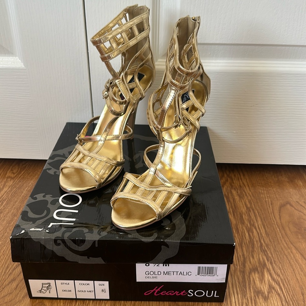 Worn only once, gold heels! Comfortable just no longer need them.